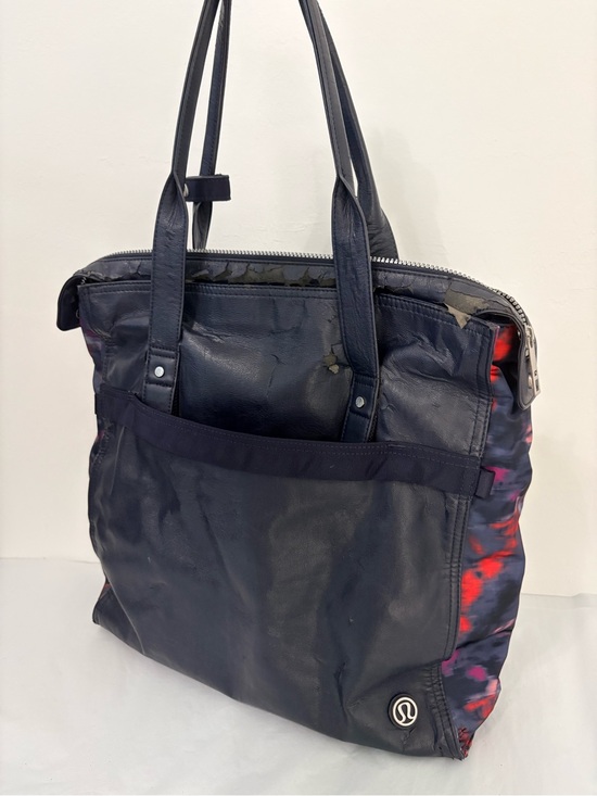 lululemon athletica Handbags - Lululemon Follow Your Bliss Bag Naval Blue / Simple Blooms Regal Plum /Black GUC